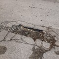 Buche su via Gioia, la preoccupazione degli esercenti