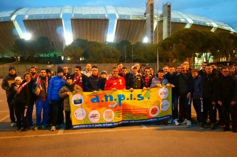 Foto di gruppo con lo sfondo dell'